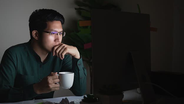 Man assessing customer risk models