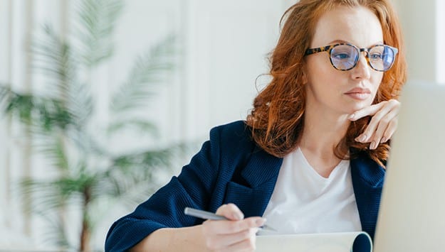 woman assessing aml geographic risk